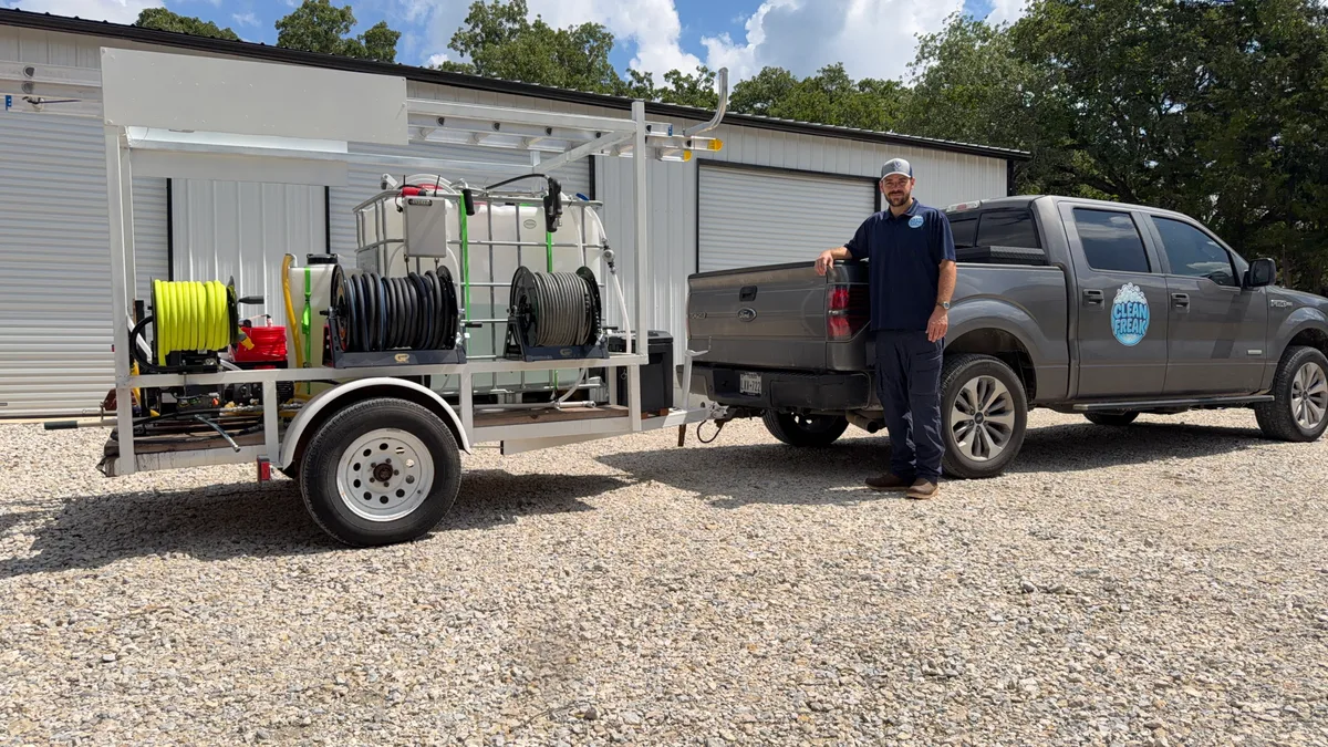 Cutler Polk, owner of Clean Freak, with the pressure washing equipment