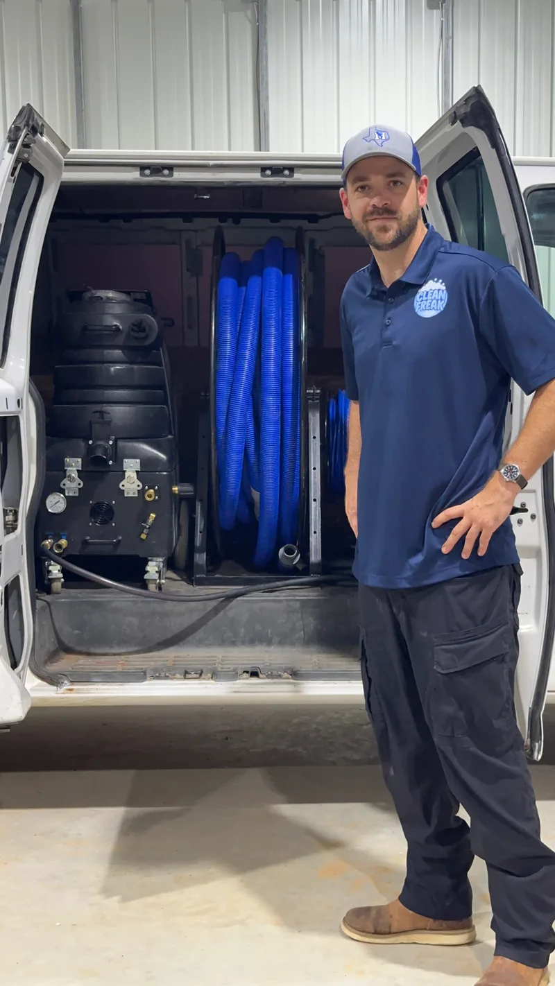 Cutler Polk, owner of Clean Freak, with the van and truck-mount carpet cleaning equipment